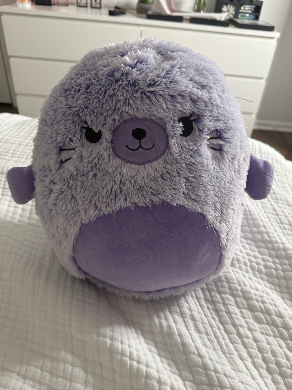 Squishmallows Ellen the Purple Seal Fuzz-A-Mallow, a 12-inch fuzzy plush toy